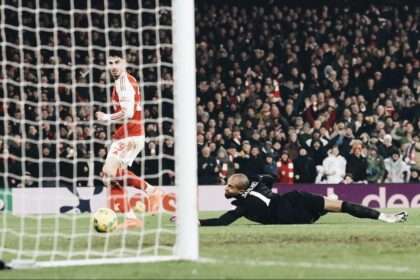 Kai Havertz watches the ball hit the net as Arsenal score against Chelsea