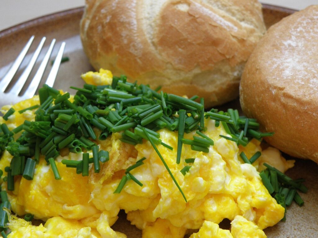 Soft scrambled eggs served on toasted sourdough