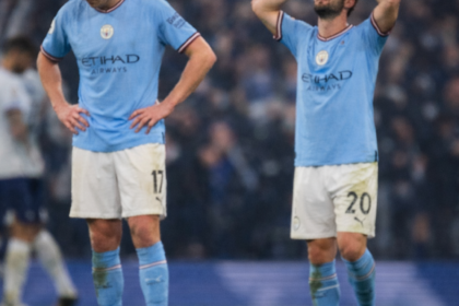 Manchester City players show disappointment after blowing a two-goal lead in a 2–2 Premier League draw against Tottenham Hotspur