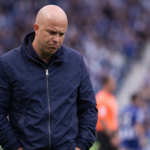 Arne Slot looking dejected on the touchline at the Amex Stadium