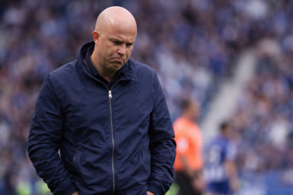 Arne Slot looking dejected on the touchline at the Amex Stadium