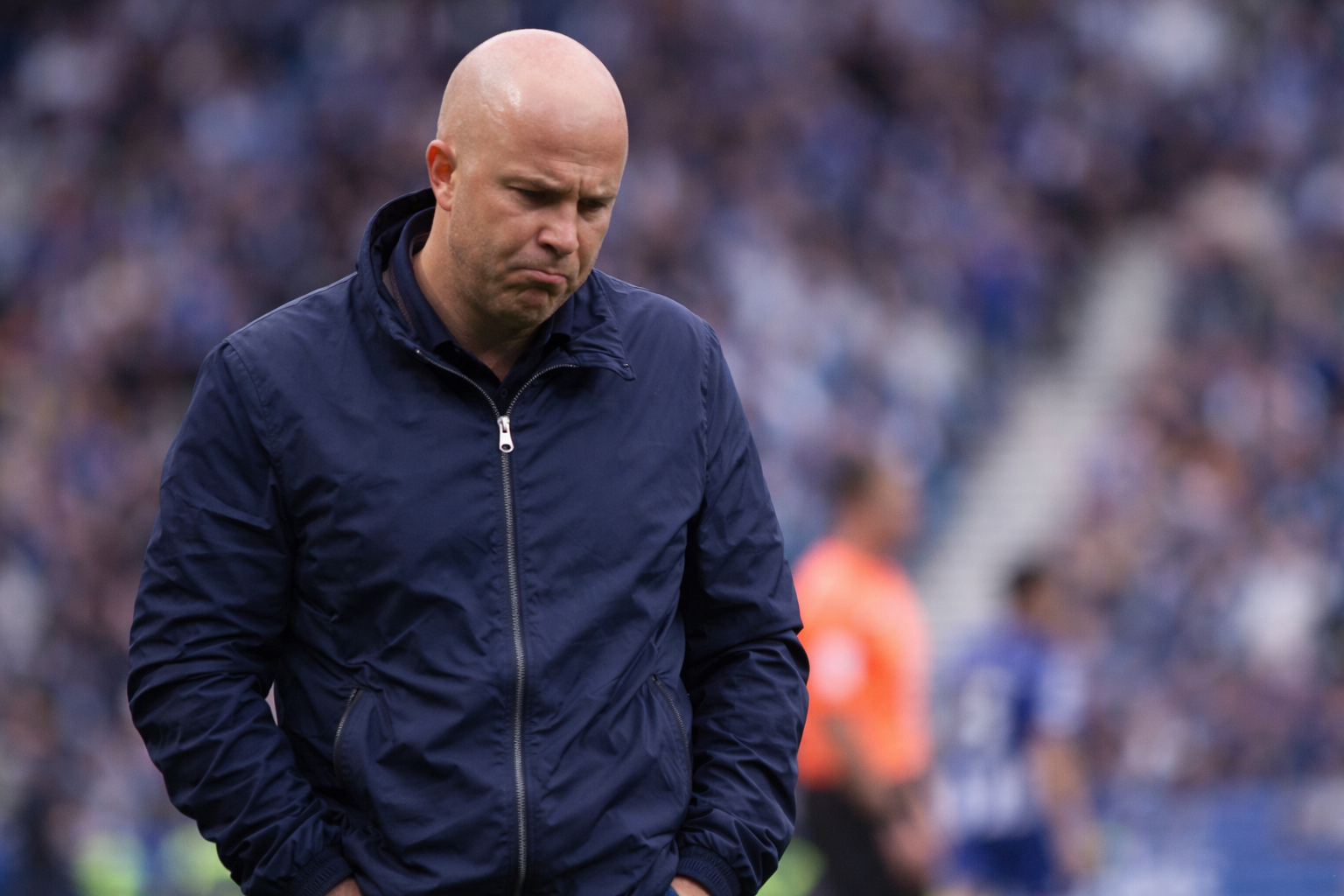 Arne Slot looking dejected on the touchline at the Amex Stadium