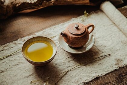 Steaming green tea in a traditional ceramic bowl