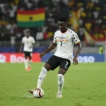 Caleb Yirenkyi controlling the ball in a Ghana national team kit
