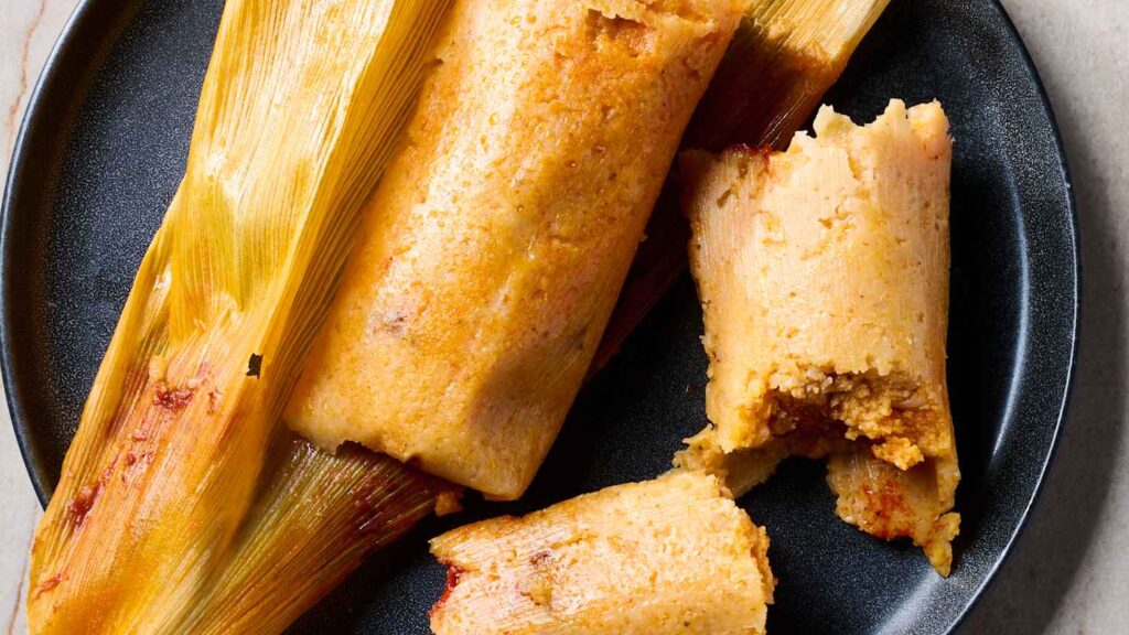 A documentary snippet showing the traditional preparation of Tamales