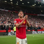 A close-up shot of Casemiro looking emotional and applauding the Stretford End after the final whistle against Brentford.
